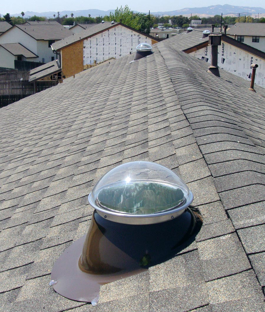 NLES bronze pitched roof tubular skylight installed