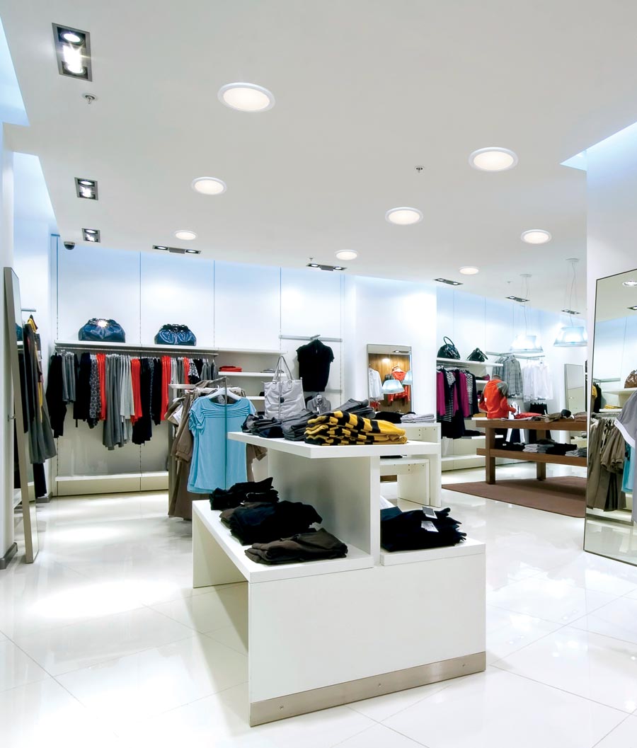 Several Natural Light commercial hard ceiling tubular skylights in clothing store